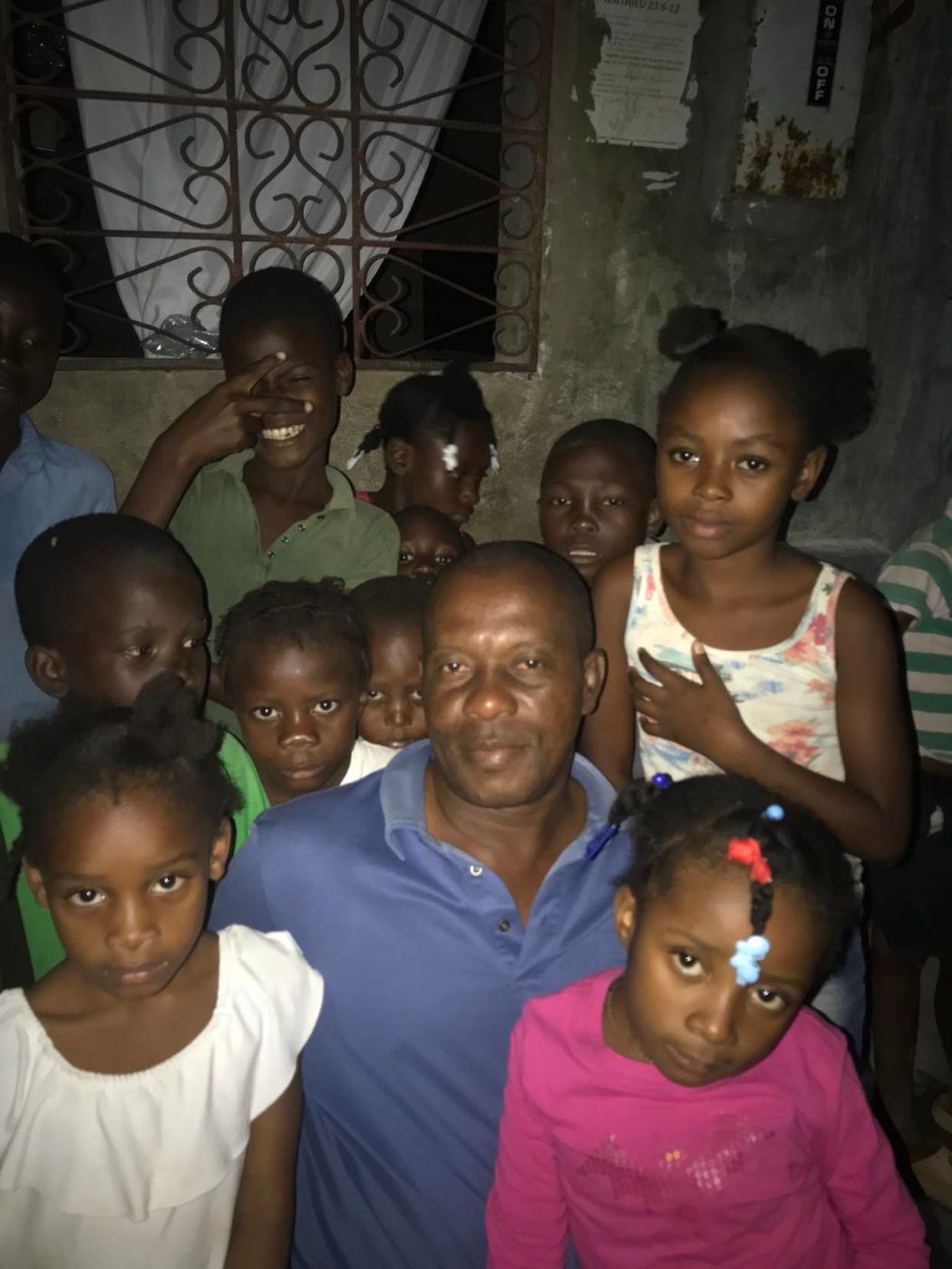 A community member with children